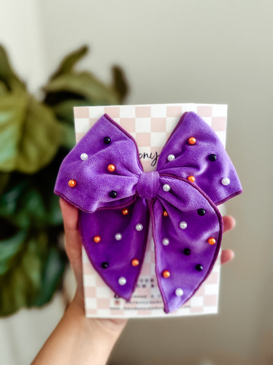 Purple Beaded Bow